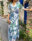 The Catalina Flutter Sleeve Maxi Wrap Dress With Contrast Lace And Tie Waist In Oversized Floral