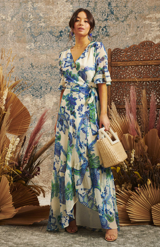 The Catalina Flutter Sleeve Maxi Wrap Dress With Contrast Lace And Tie Waist In Oversized Floral